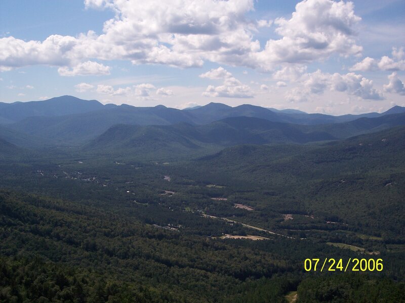 Mountain Valley Landscape — Green, Serene, Afternoon, Photograph, Mountains, Forests, Clouds