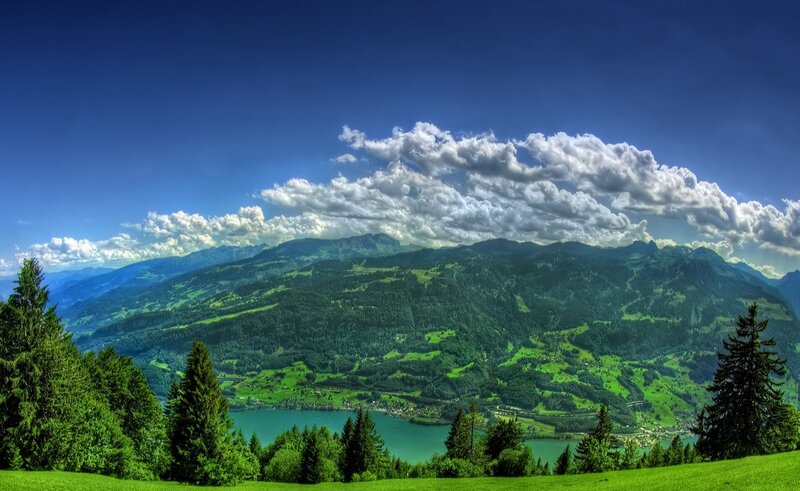 Mountain Valley Landscape — Green, Serene, Afternoon, Photograph, Mountains, Lake, Trees, Clouds, Blue, White