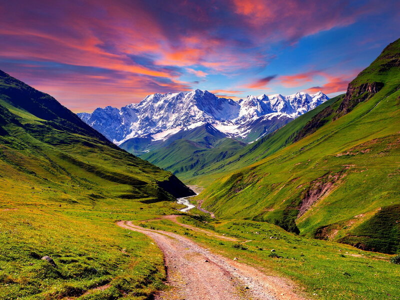 Mountain Valley Landscape — Green, Serene, Sunset, Photograph, Snow-capped Mountains, River