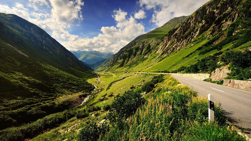 Mountain valley road with river