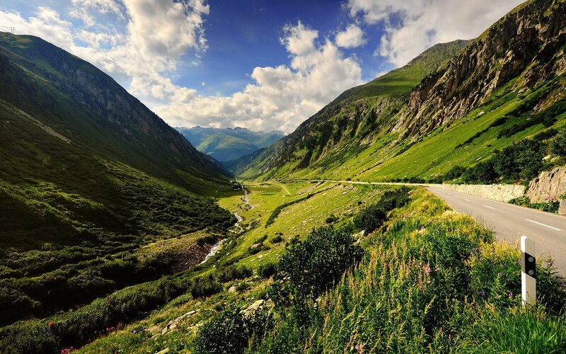 Mountain valley road with river