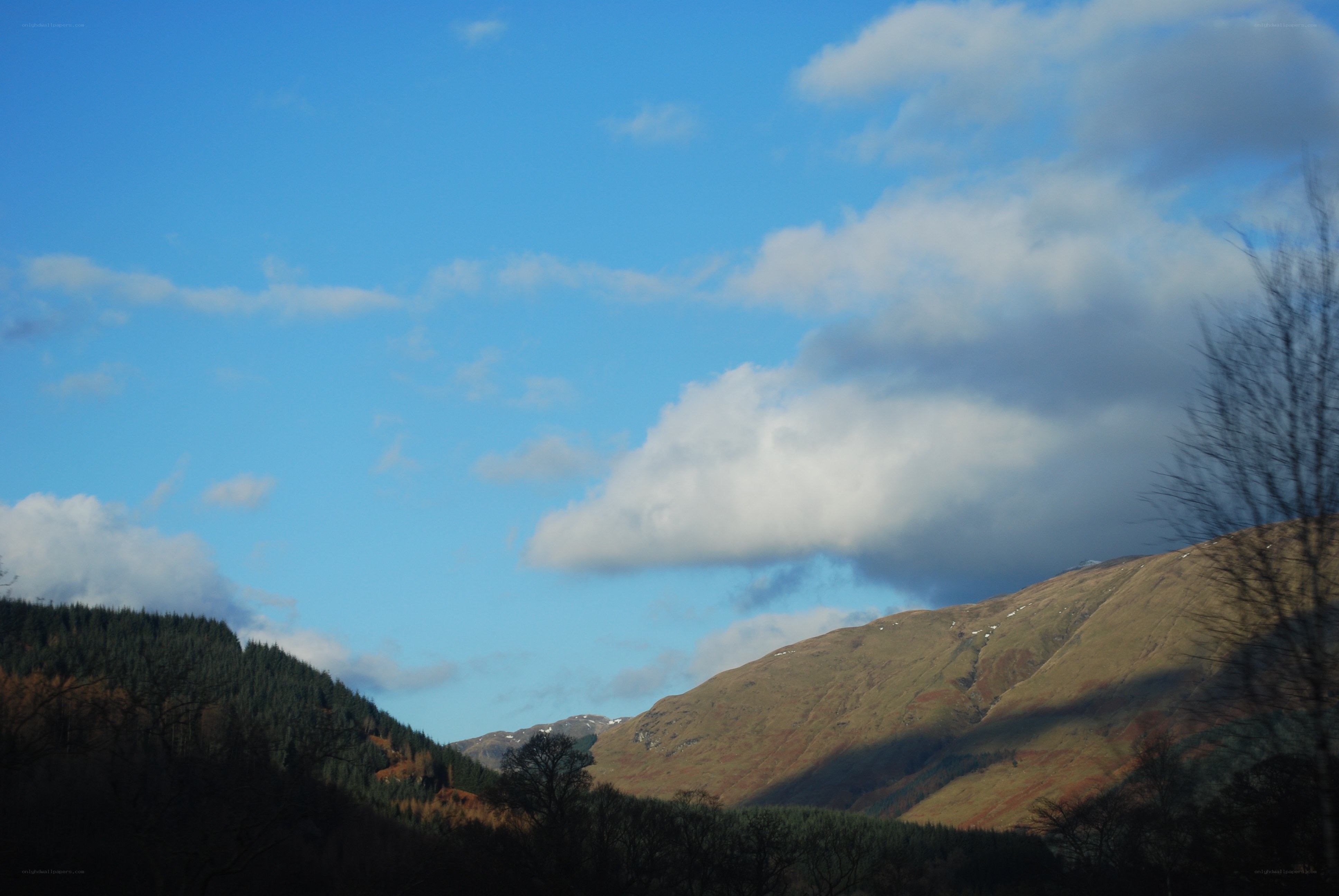 Mountain valley under blue sky
