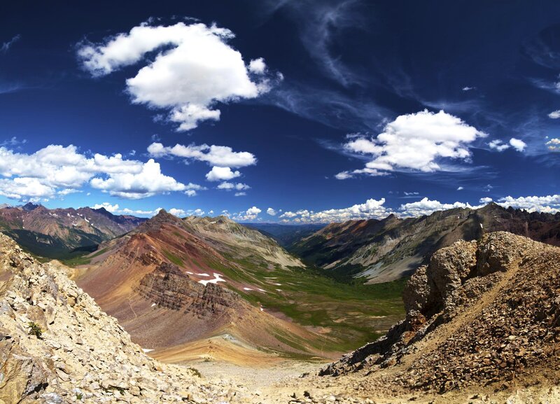mountain valley under blue sky