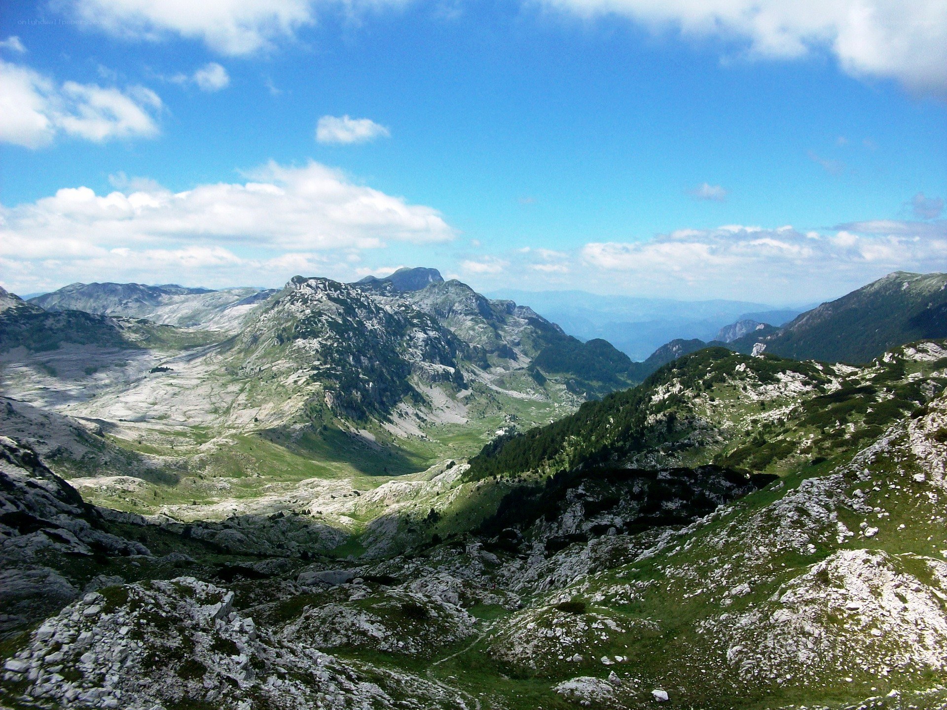 Mountain valley under blue sky