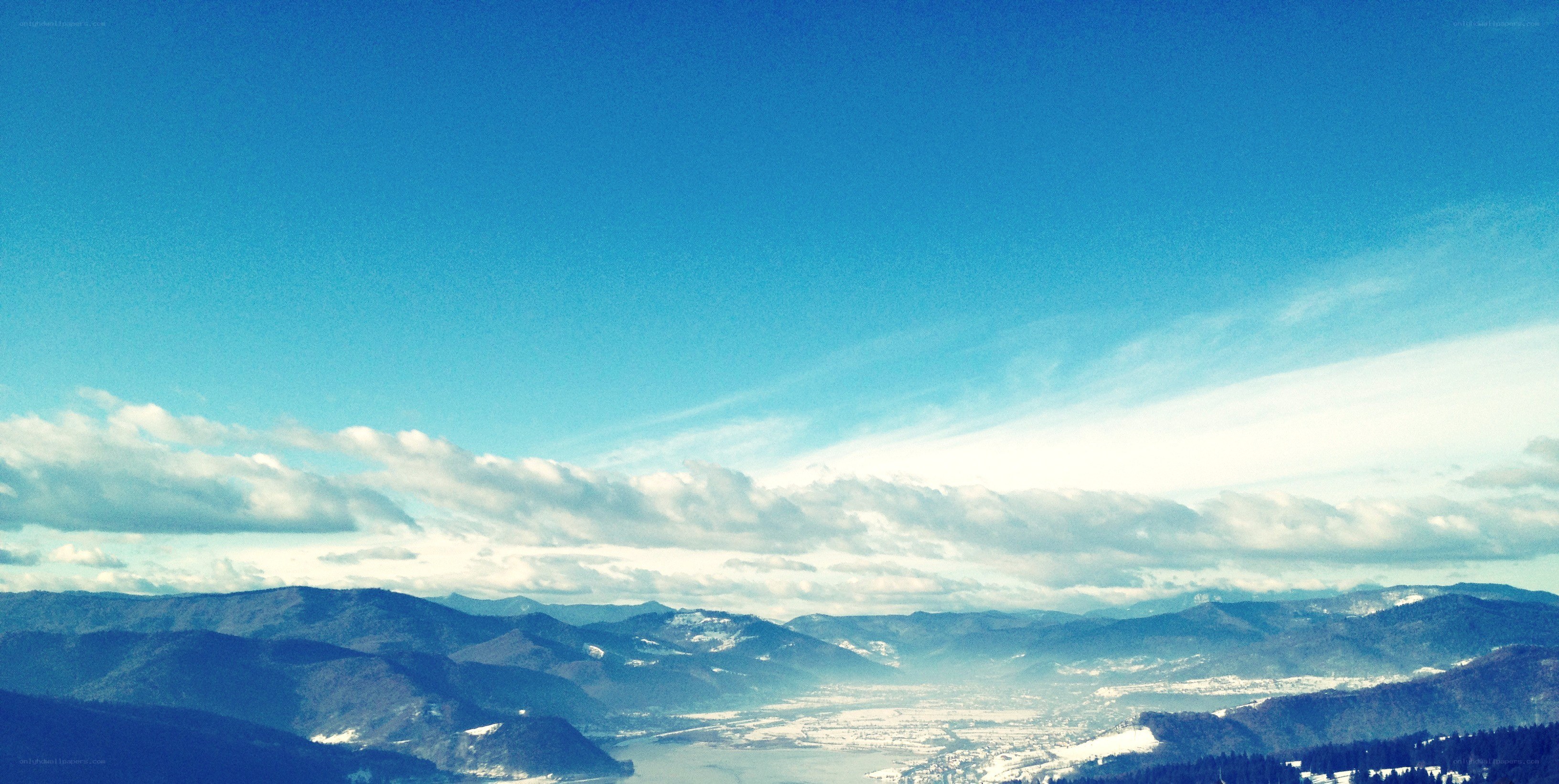 Mountain valley under blue sky