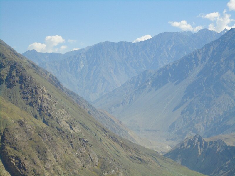 Mountain valley under blue sky