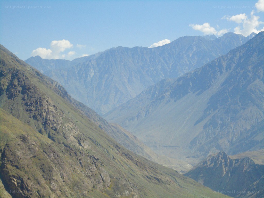 Mountain valley under blue sky