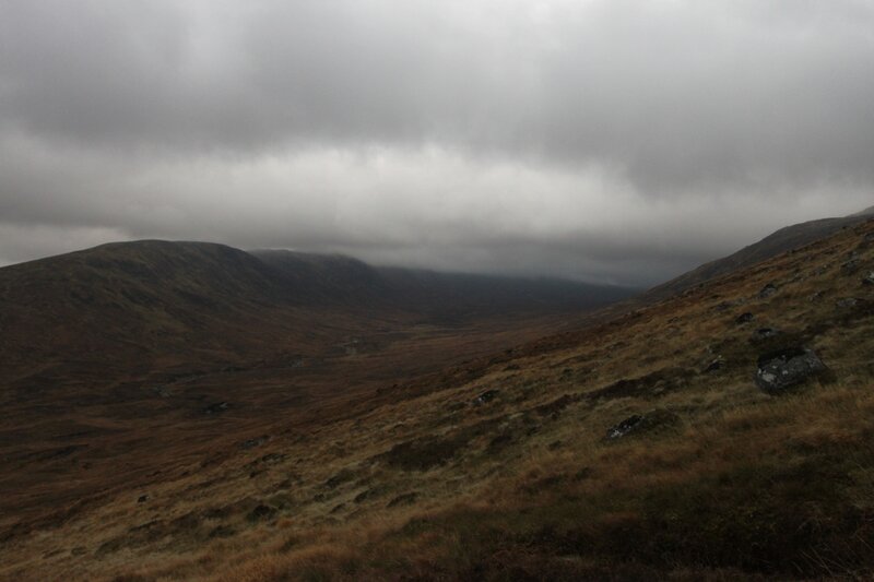 Mountain Valley under Clouds
