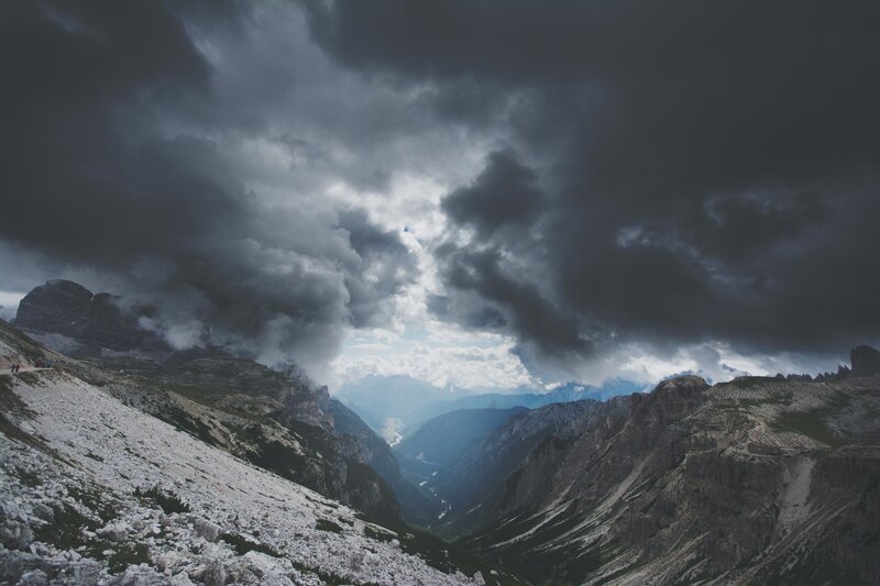Mountain Valley under Storm Clouds