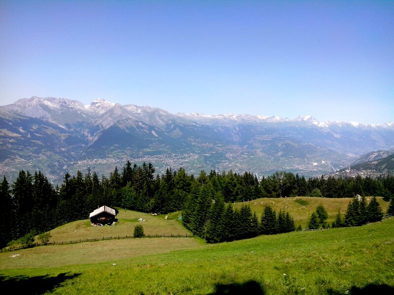 Mountain valley with alpine hut