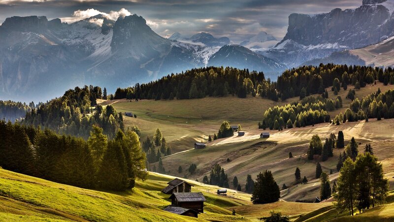 Mountain valley with alpine huts