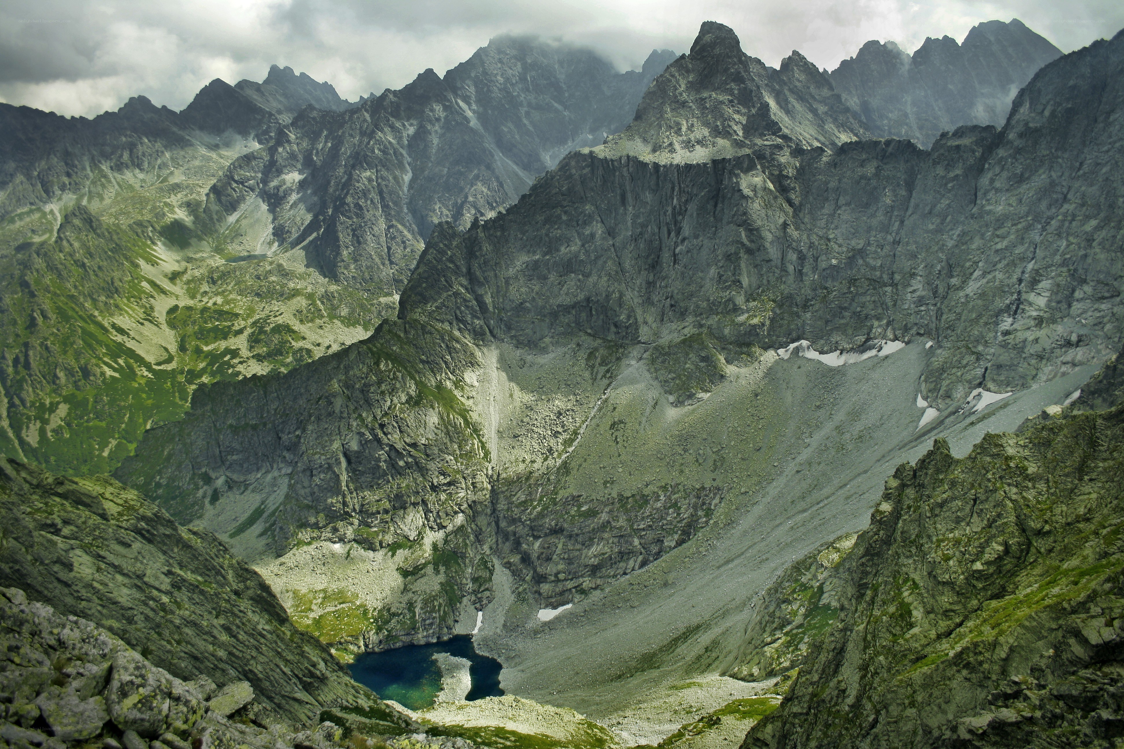 Mountain valley with alpine lake