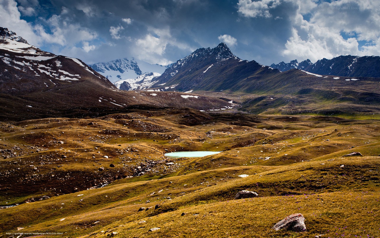 Mountain valley with alpine lake