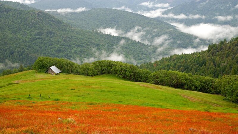 Mountain valley with barn