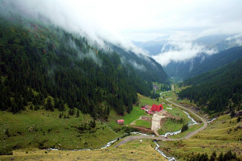 Mountain Valley with Buildings