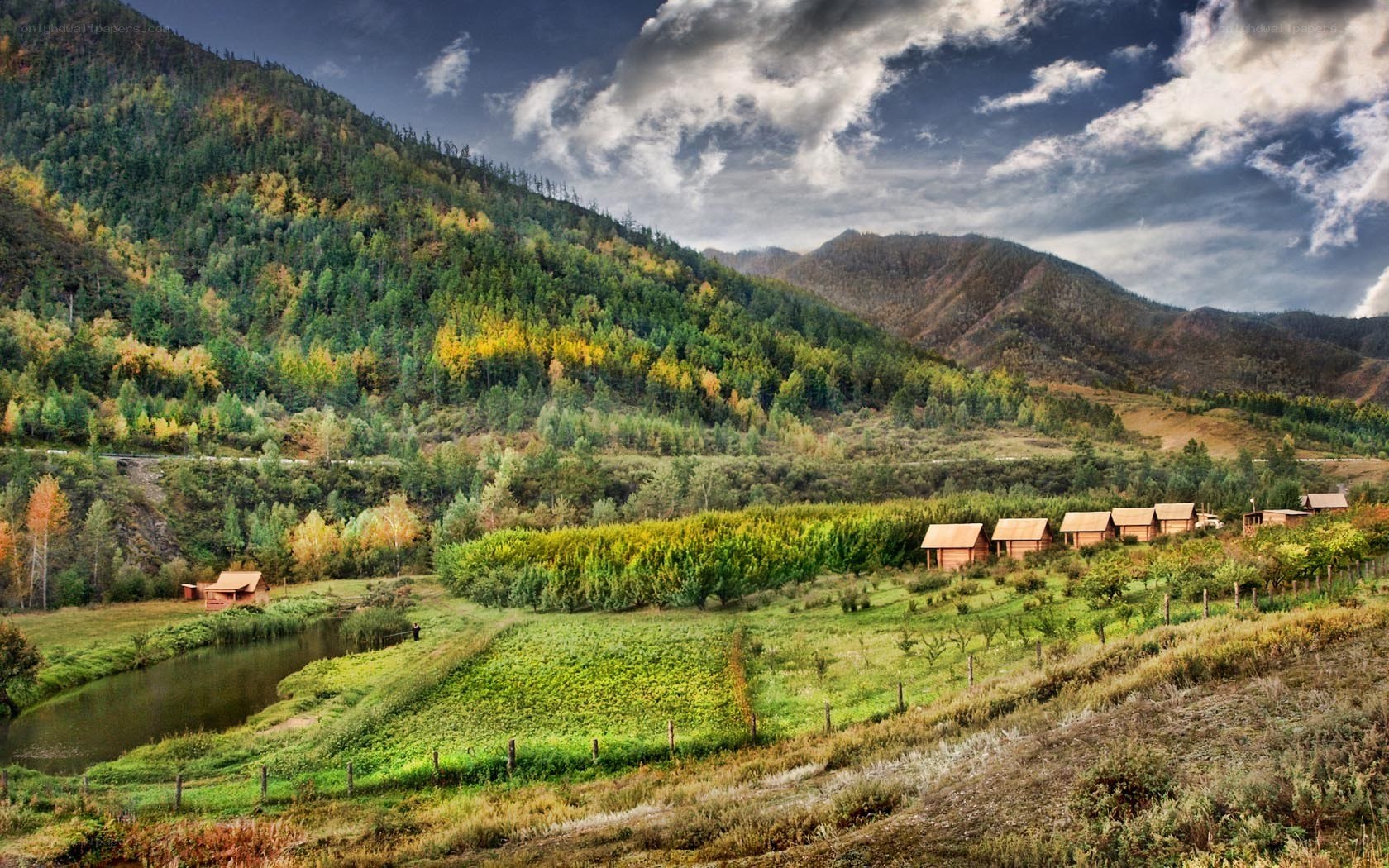 Mountain valley with cabins