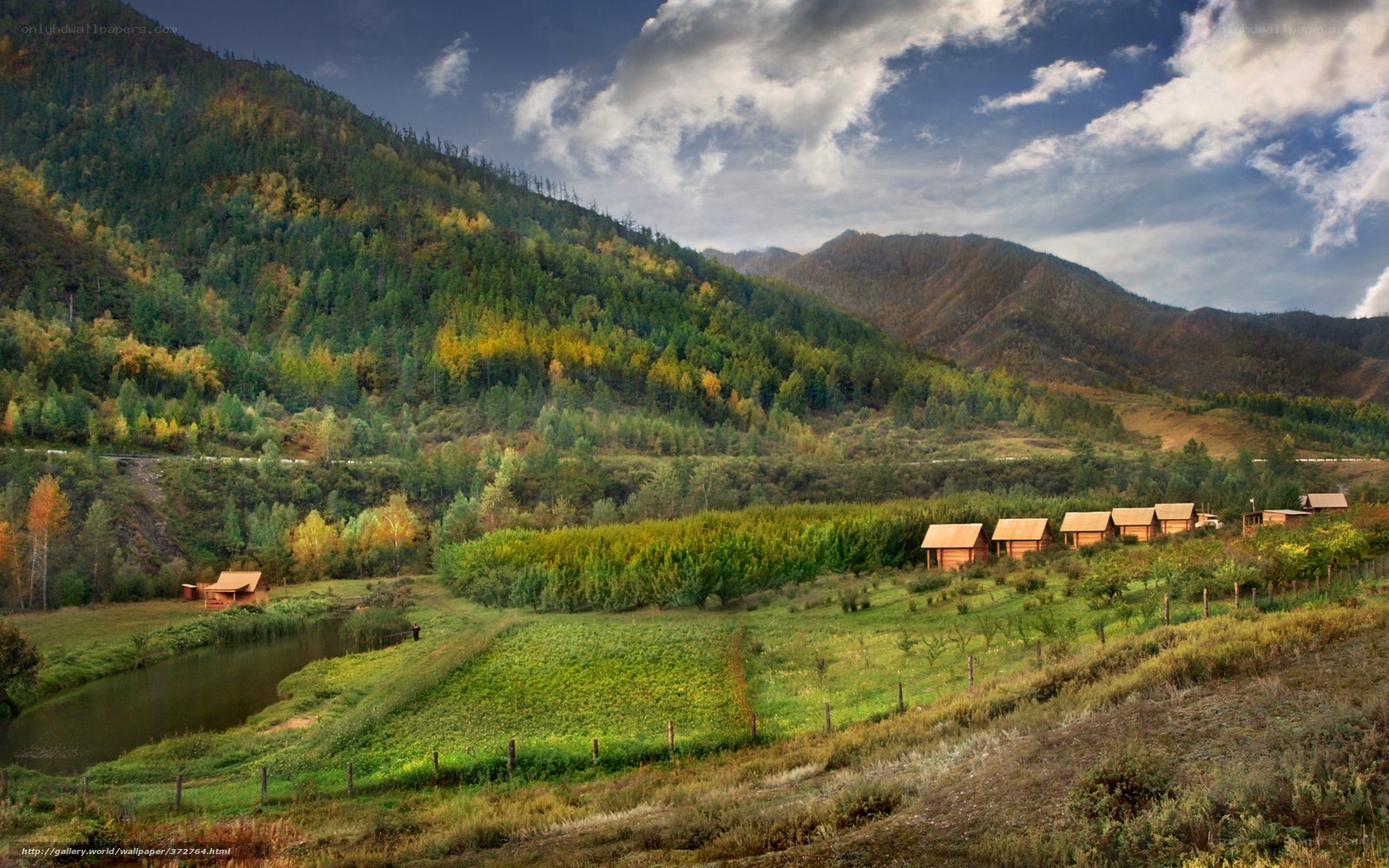 Mountain valley with cabins