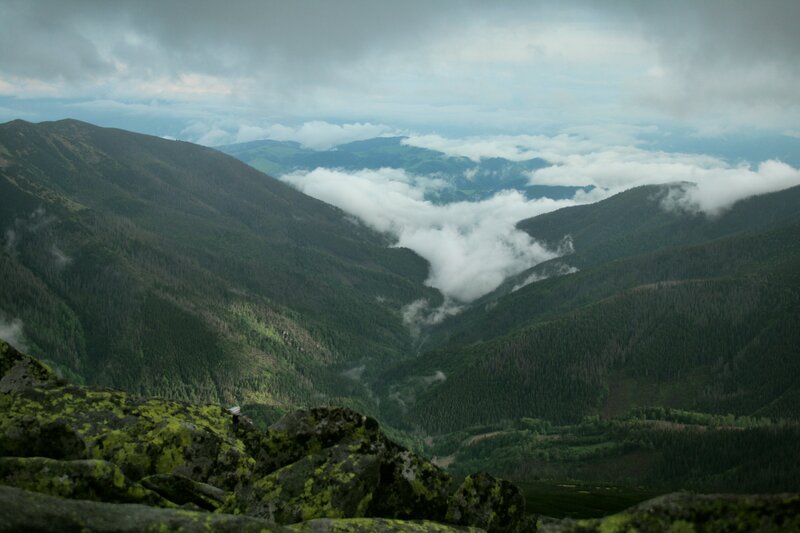 Mountain valley with clouds