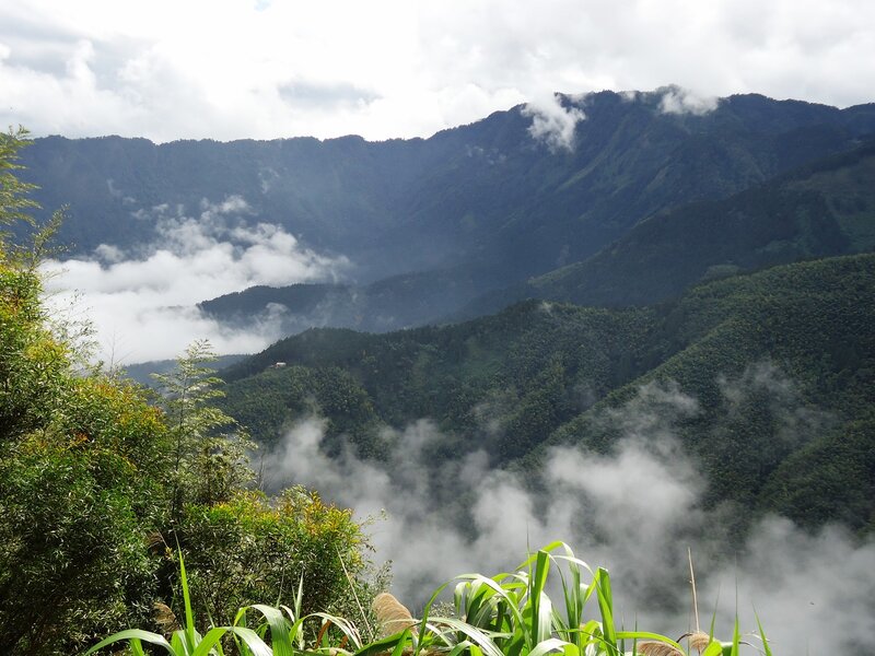 Mountain valley with clouds