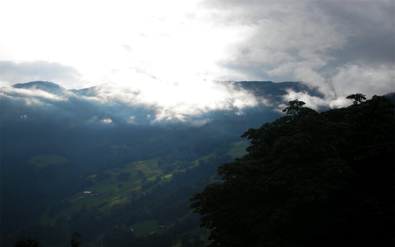 mountain valley with clouds