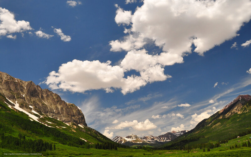 Mountain valley with clouds
