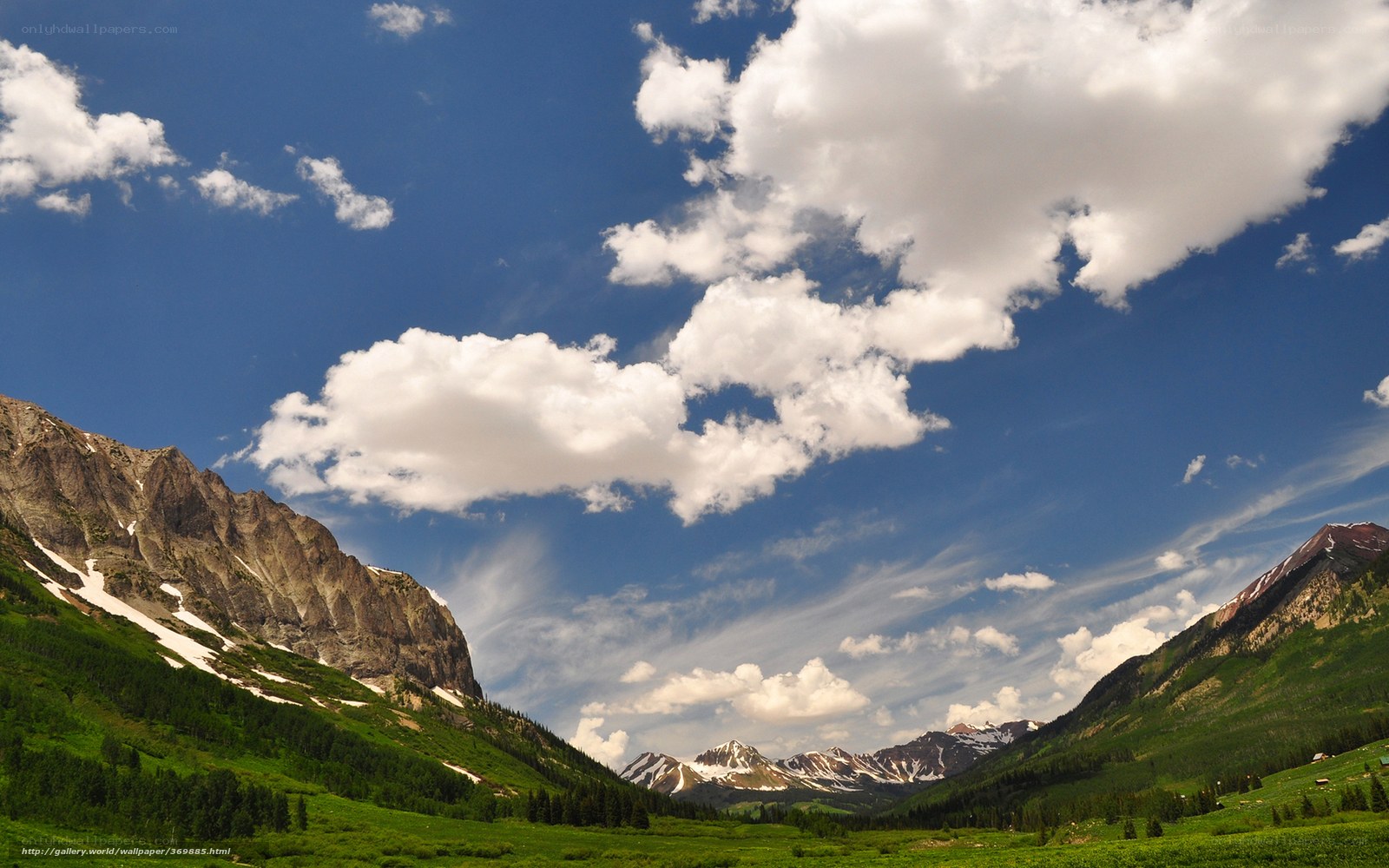 Mountain valley with clouds