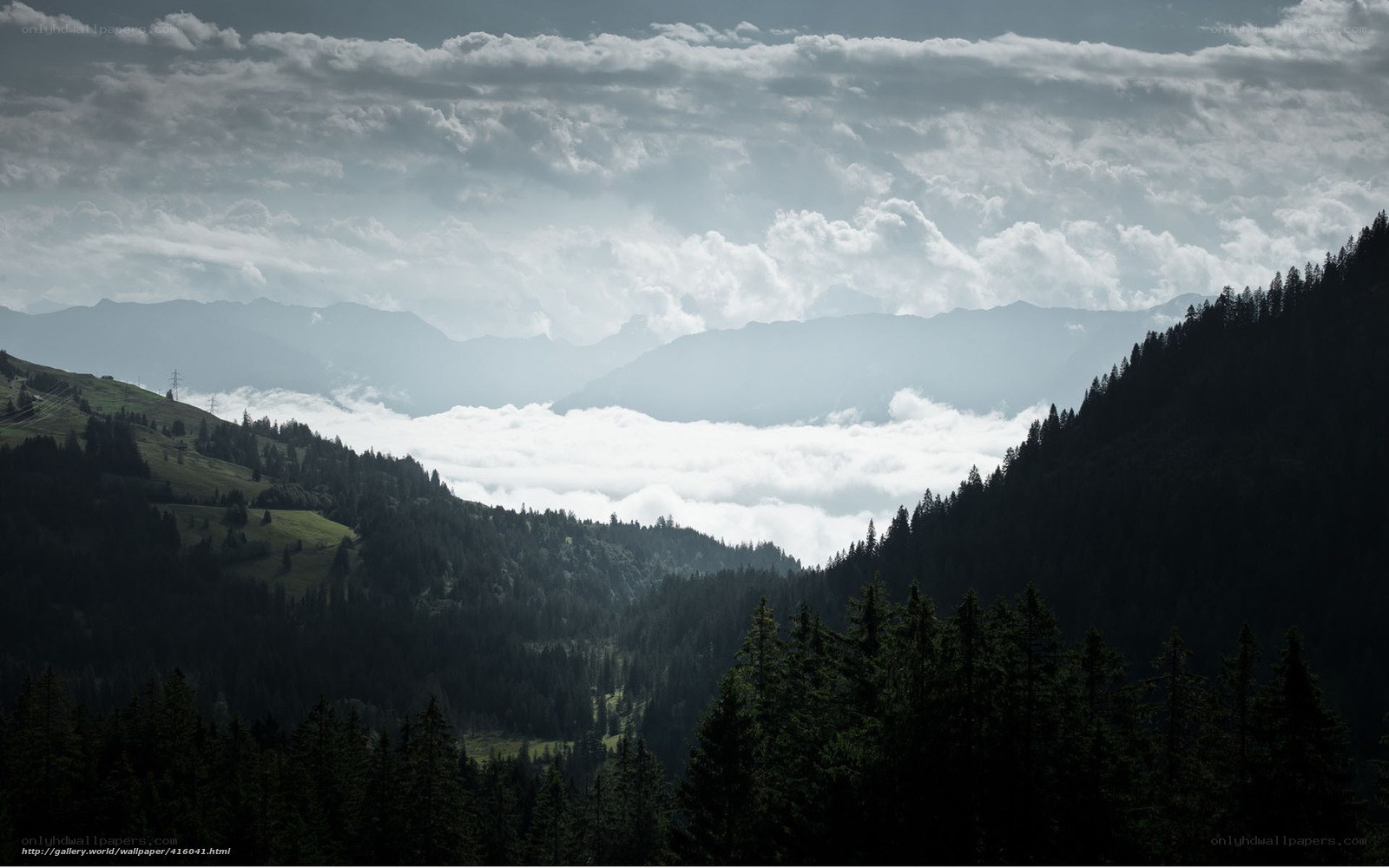 Mountain valley with clouds