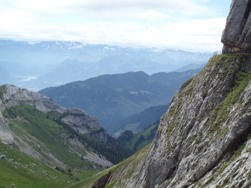 Mountain valley with distant peaks