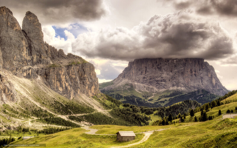 Mountain valley with dramatic clouds