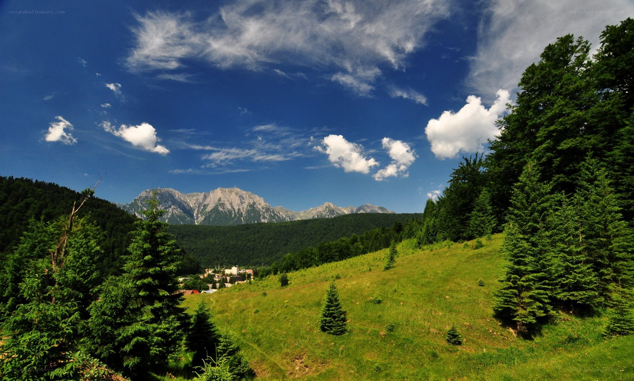Mountain valley with green hills