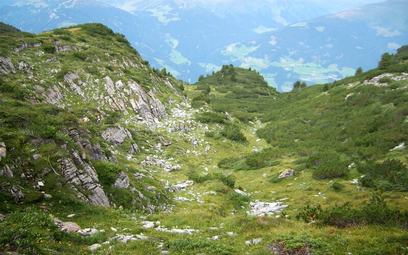 Mountain valley with green slopes
