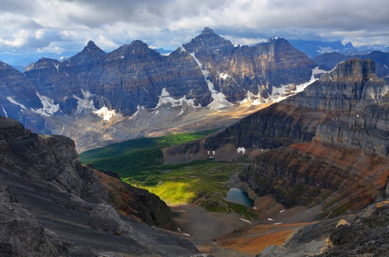 Mountain valley with lake and peaks