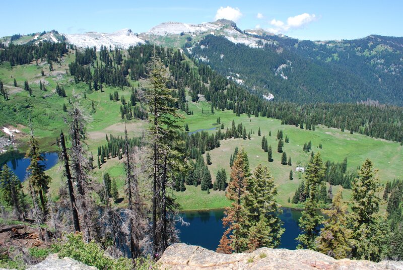 Mountain valley with lakes and forests