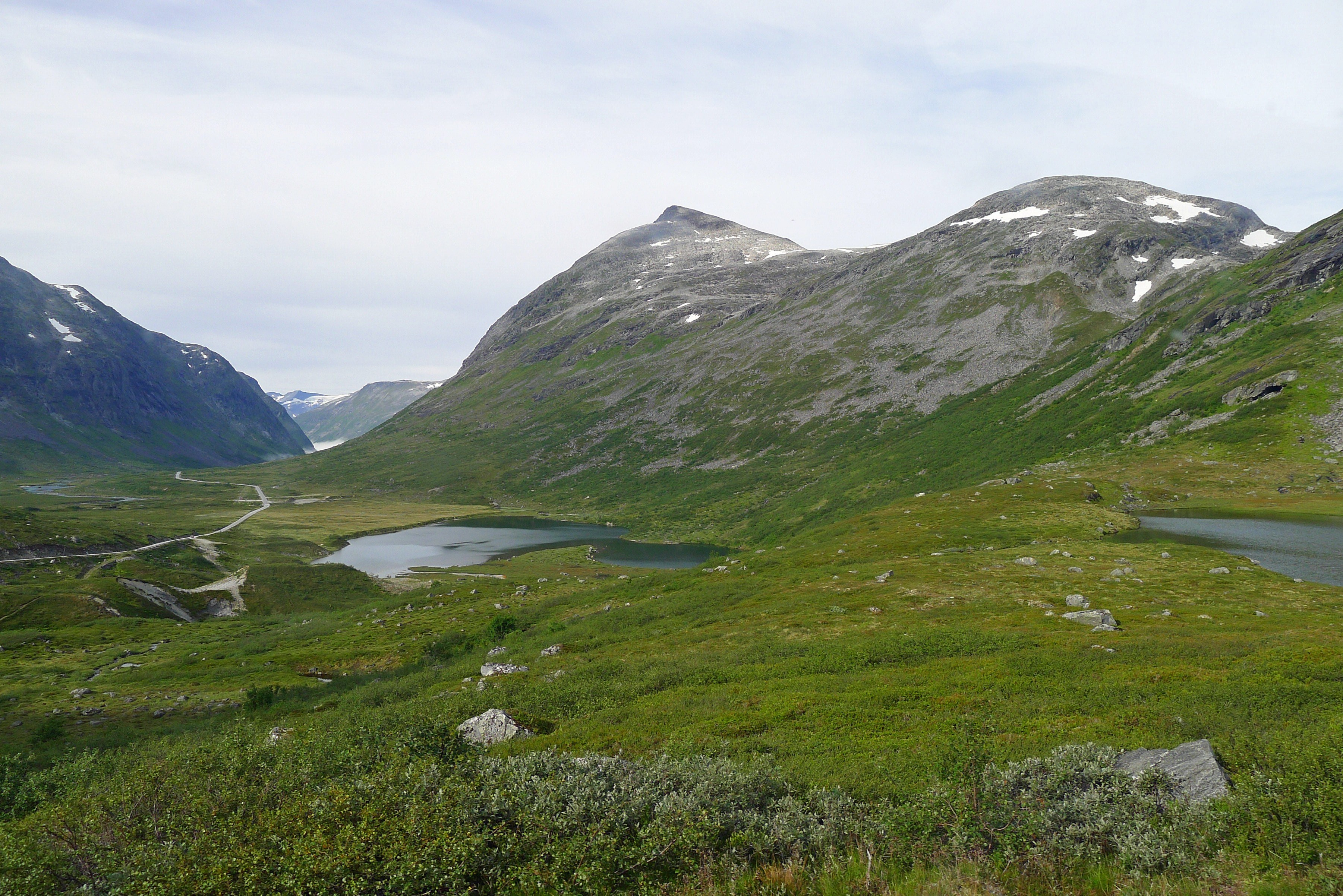 mountain valley with lakes and road