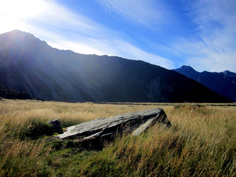 Mountain valley with large rock