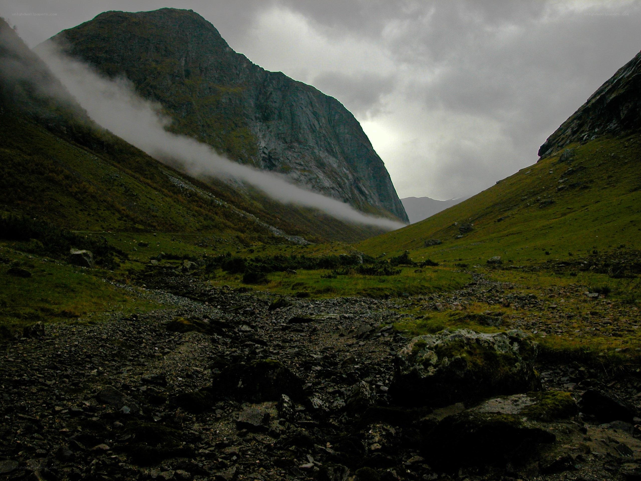 Mountain valley with mist