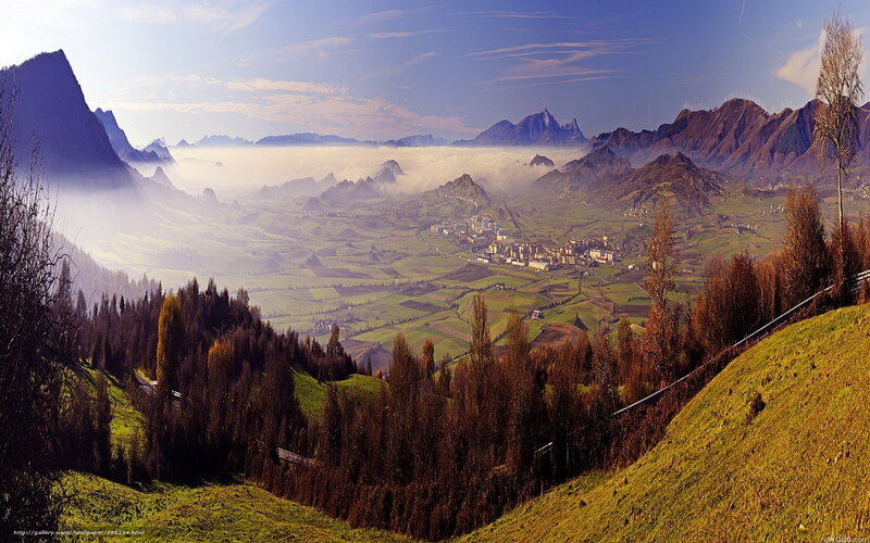Mountain valley with misty landscape