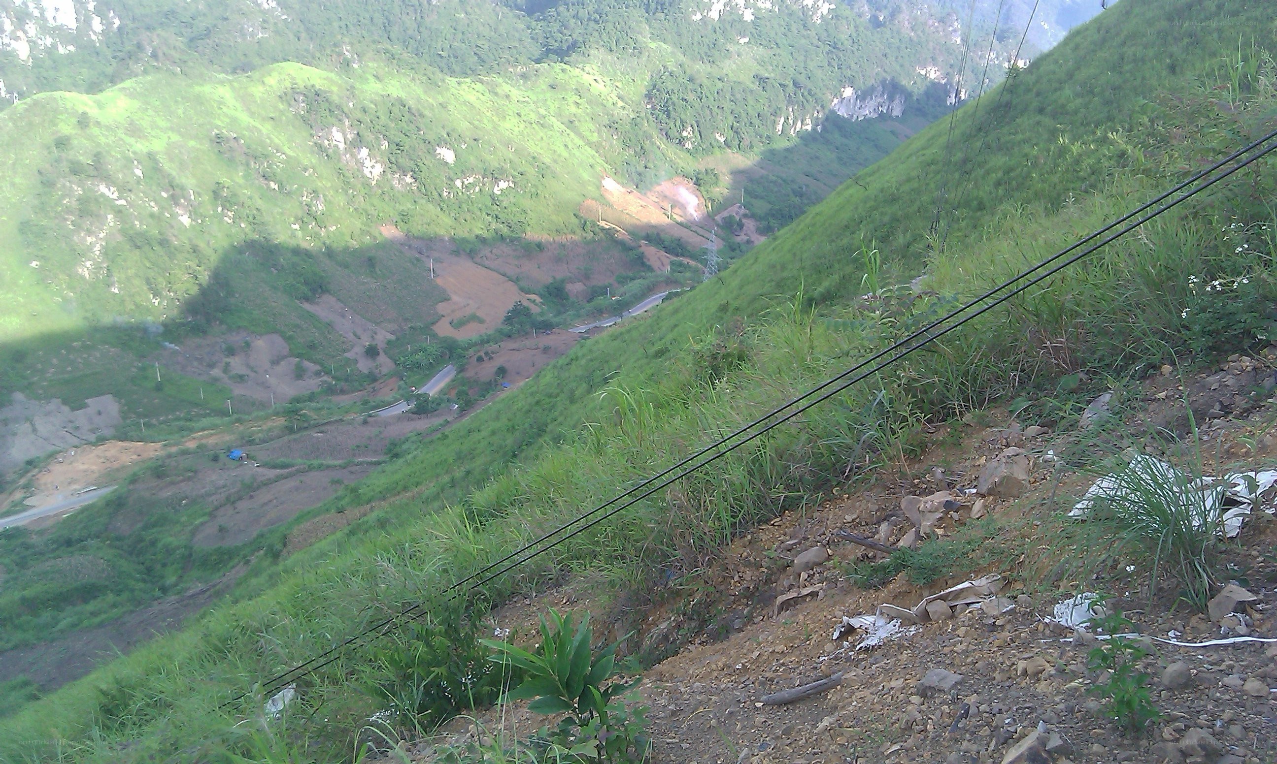mountain valley with power lines