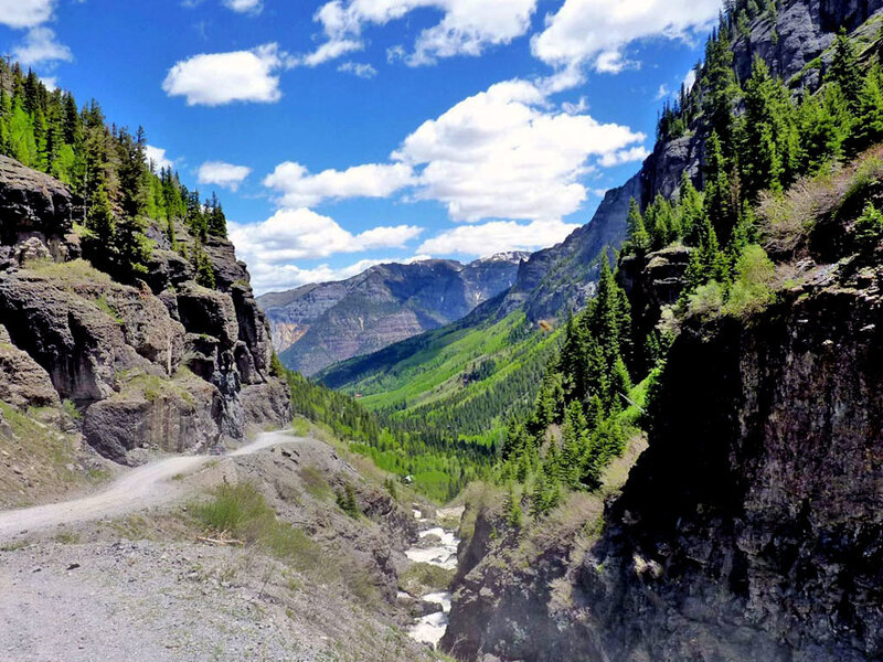 Mountain valley with river and forest