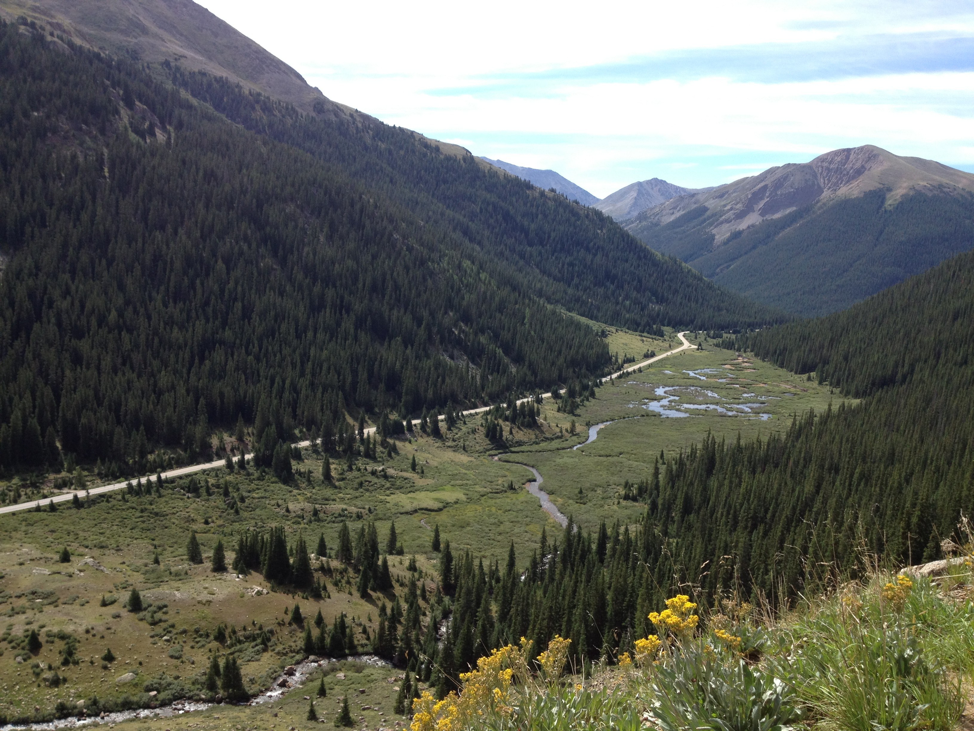 Mountain valley with river and road