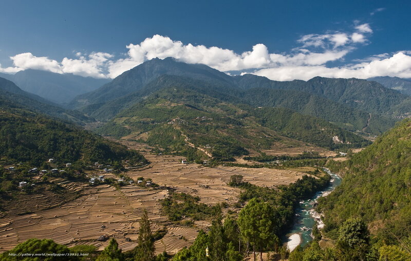 Mountain valley with river and terraced fields