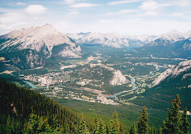 mountain valley with river and town