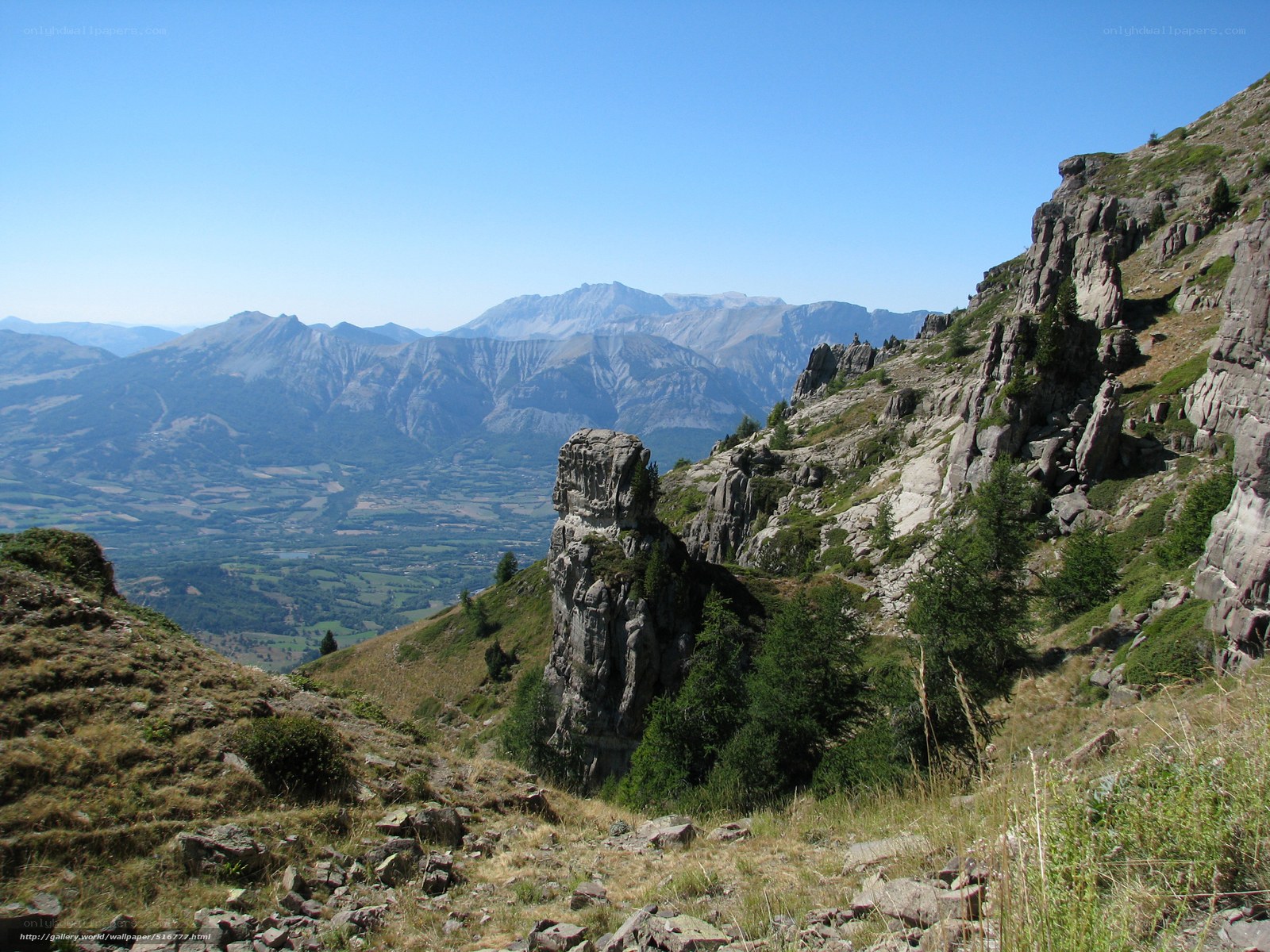 Mountain valley with rocky outcrop
