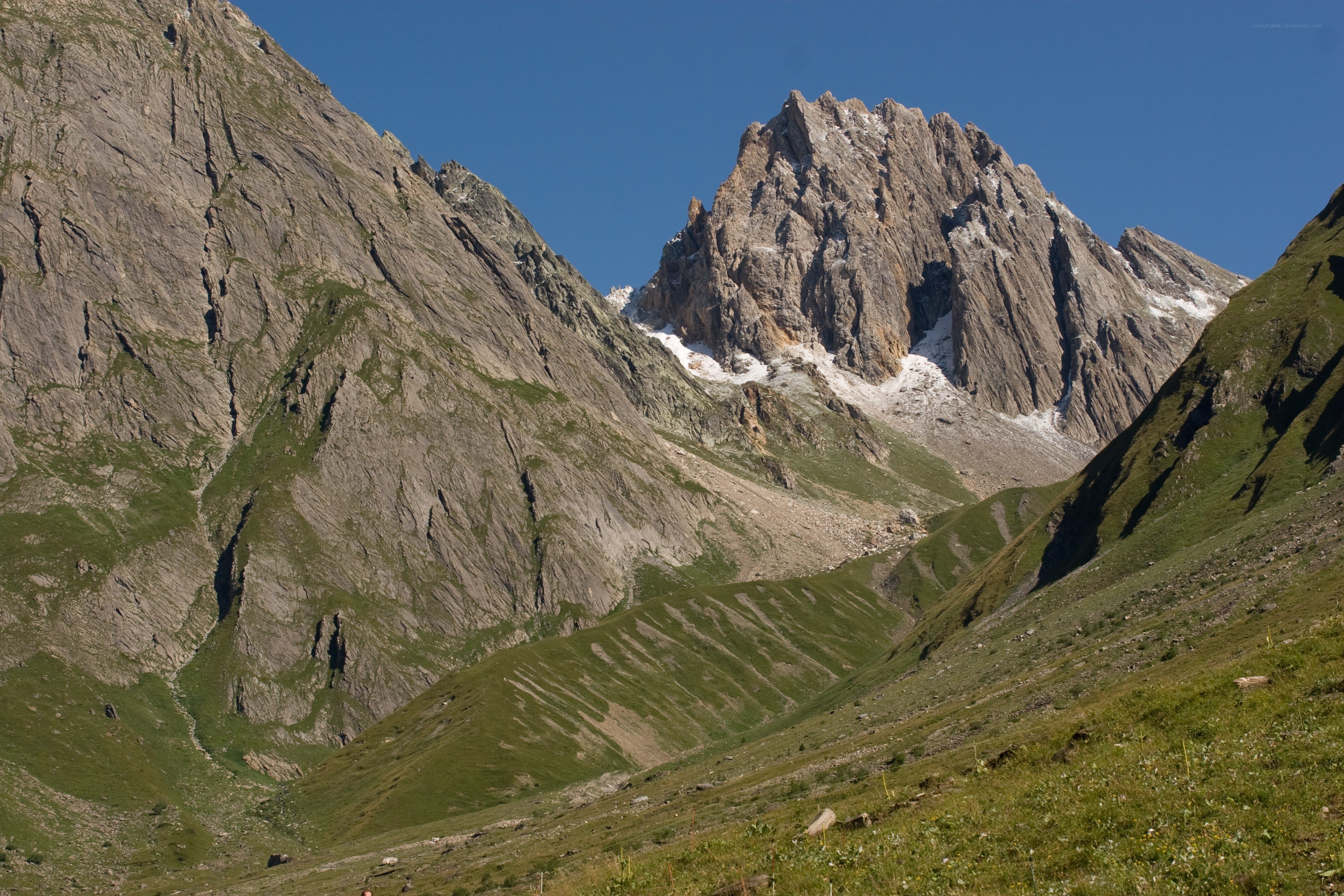 Mountain valley with rocky peaks