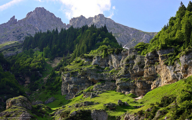 Mountain valley with rocky peaks