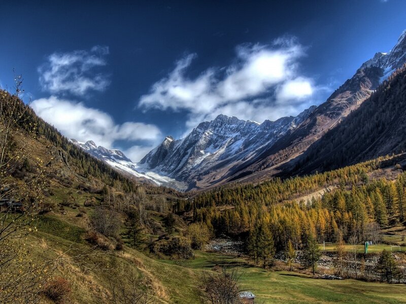 Mountain valley with snow-capped peaks