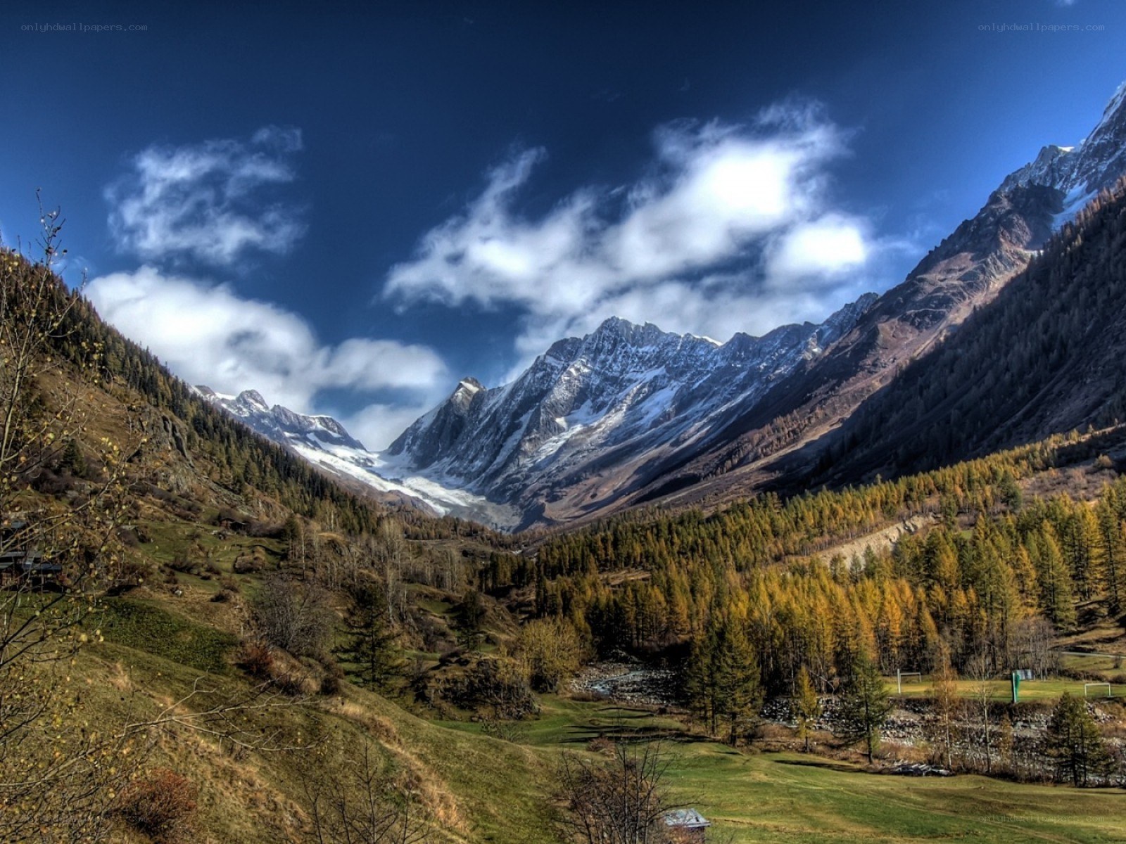 Mountain valley with snow-capped peaks