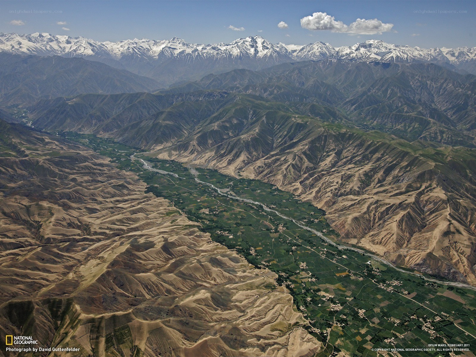 Mountain valley with snow-capped peaks