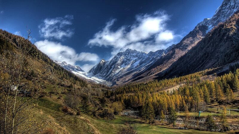 Mountain valley with snow-capped peaks