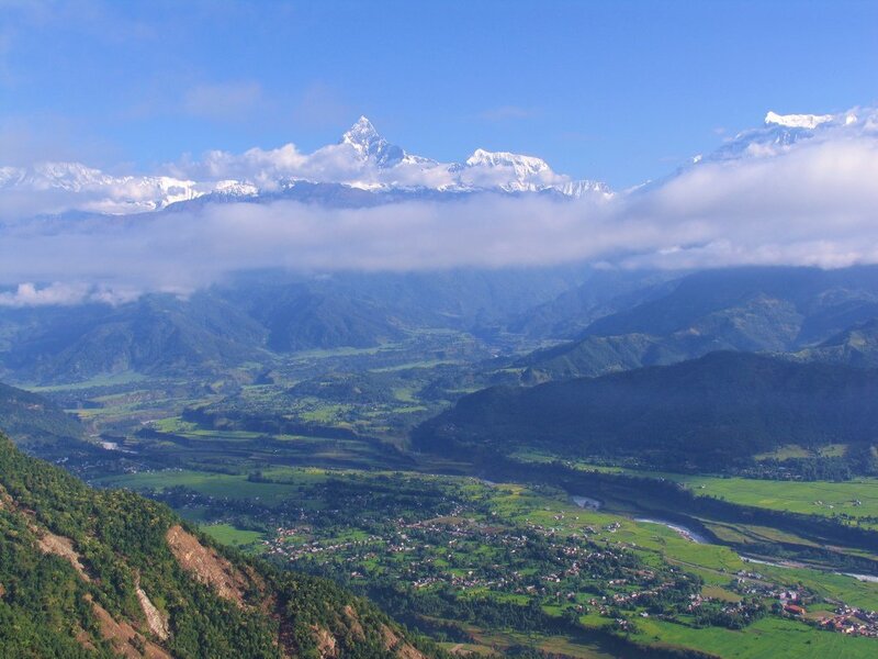 Mountain valley with snow-capped peaks